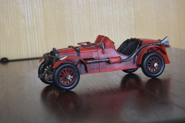 Car models are antiques, and these days are for display. But whenever you look Made him think of olden days as a child