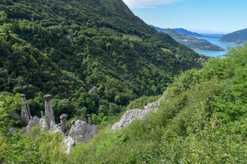 Monument rocks (Chalk Pyramids) of Zone at lake Iseo on Italy
