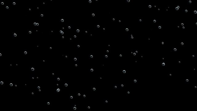 Magic bubbles. Background of soda water with bubbles, sparkling wine, champagne or beer.
