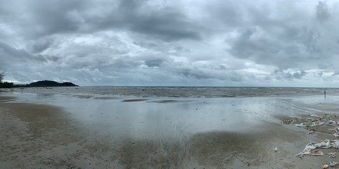 Cloudy sky background. White fluffy clouds in the sky on the beach