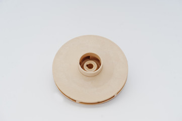 Spare part  round disc for water pump isolated on white.