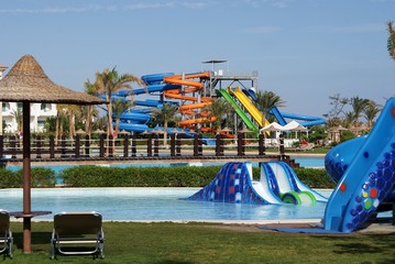 Aquapark colorful slides with a pool for children