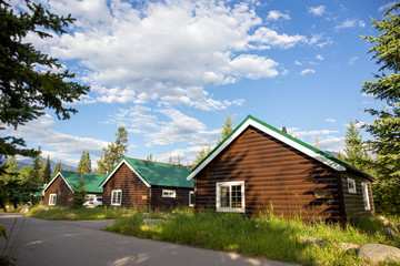 Fototapeta na wymiar Cozy log cabin in a national park resort in Canada in the Canadian Rockies