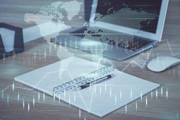 Multi exposure of chart and financial info and work space with computer background. Concept of...