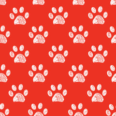 Doodle white paw print seamless fabric design repeated pattern with red background