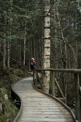 woman hiking in the national park d´aiguestortes in the Pyrenees in Spain