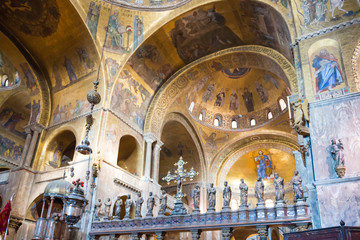 Fototapeta na wymiar Luxury interior of Saint Mark's Basilica with gold and lots of mosaics. Venice, Italy