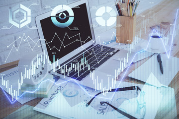 Forex market chart hologram and personal computer background. Multi exposure. Concept of investment.