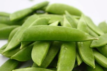 fresh peas on white background