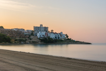 Fototapeta na wymiar View of Altafulla, Tarragona, Spain. Beach in summer on the Sunset.