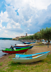 Marta (Italy) - A little medieval town on Bolsena lake with suggestive sidewalk and water front;...