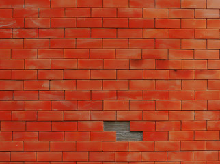 The red brick wall background 