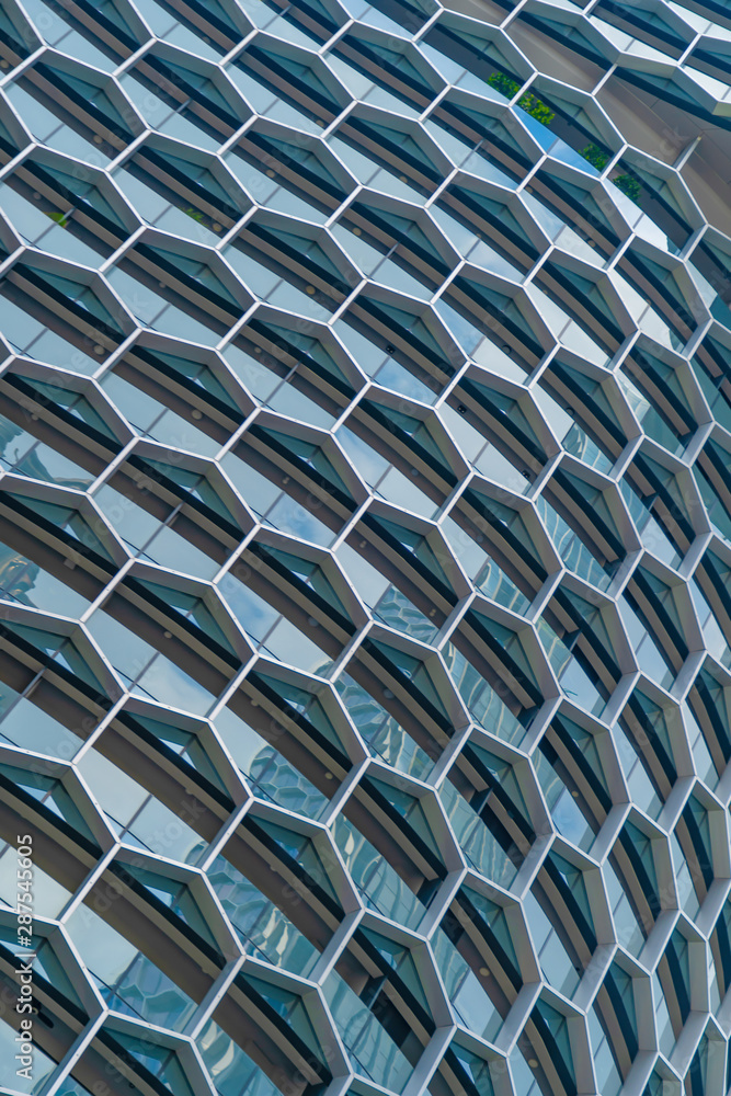 Aufkleber office buildings. structure of hexagon windows in futuristic technology network connection concept. 