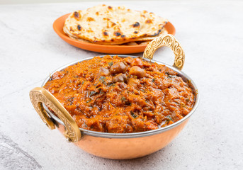 Indian Healthy Cuisine Chana Masala Also Known as Spicy Chickpeas, Channay, Chole Masala or Chholay is a Tasty & Flavourful Curry Made By Cooking Chickpeas in a Spicy Onion Tomato Masala Gravy