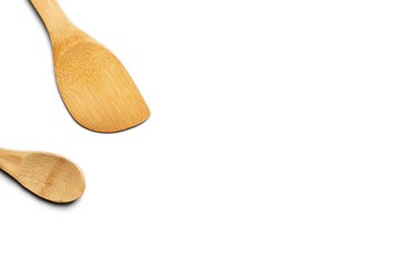 Wooden spoon and stirrer. Isolated on white background. Top view.