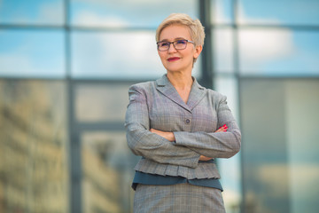 portrait of stylish woman in a suit with a short haircut