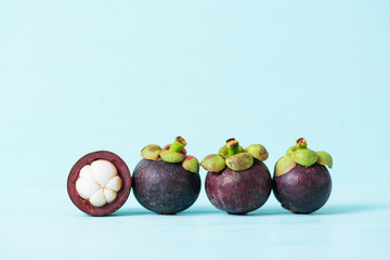 Mangosteen on pastel color background