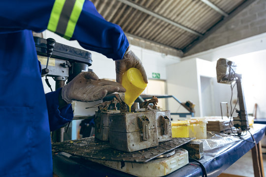 Man working in a sports equipment factory