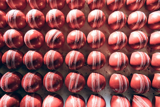 Overhead view of cricket balls in row