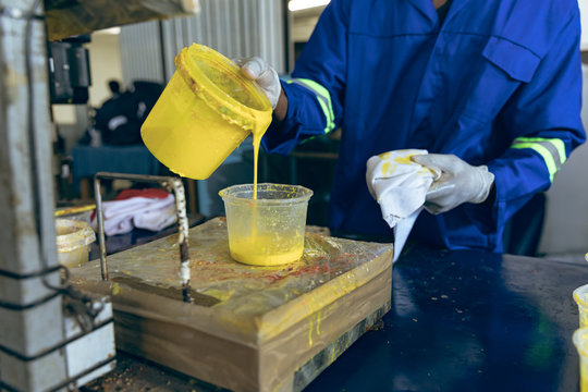 Man working in a sports equipment factory