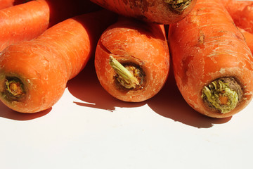 Background with carrots isolated on a white. Food background