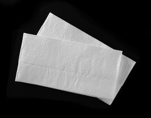 White tissues, handkerchiefs isolated on black background, top view