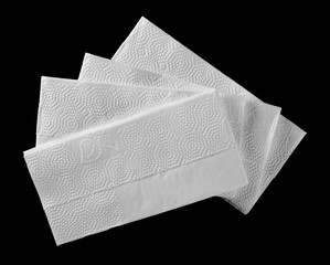 White tissues, handkerchiefs isolated on black background, top view