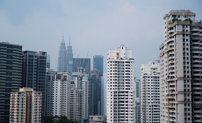 Fototapeta na wymiar Aerial panorama of Kuala Lumpur city skyline during cloudy day, Malaysia