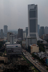 Obraz premium Aerial view of Kuala Lumpur city skyline during cloudy day, Malaysia