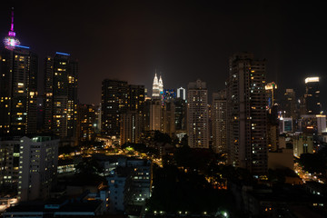 Fototapeta na wymiar Aerial drone view of Kuala Lumpur city skyline at night, Malaysia