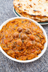 Indian Healthy Cuisine Chana Masala Also Known as Spicy Chickpeas, Channay, Chole Masala or Chholay is a Tasty & Flavourful Curry Made By Cooking Chickpeas in a Spicy Onion Tomato Masala Gravy
