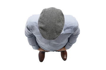 top view. a young man in a checkered cap