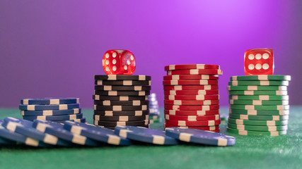 poker chips, dice on table close up