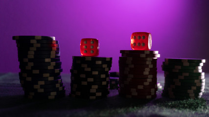 poker chips, dice on table close up