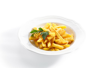 Macro Shot of Fries or French Fries on White Restaurant Plate Isolated