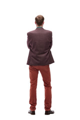 Fototapeta premium rear view. young man standing in front of white blank screen