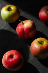red apples on black background