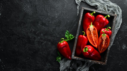 Sweet red bell pepper. Fresh vegetables. Top view. Free space for your text.