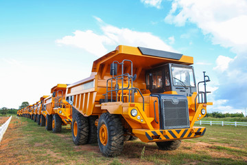 Fototapeta premium Yellow mining trucks