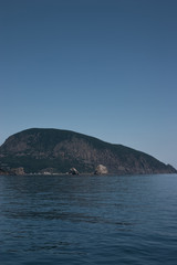 Mountain Ayu-Dag and Adalars in the Crimea in the beginning of summer. Black Sea.