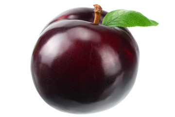 one plum fruit with green leaf isolated on white background.