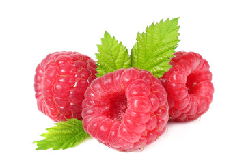 ripe raspberries with green leaf isolated on white background macro