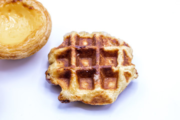 Close up Caramel waffles dessert isolate on white background.