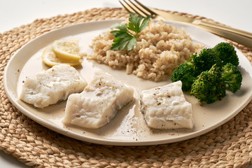 Steamed cod with brown rice and vegetables, dash fodmap diet side view