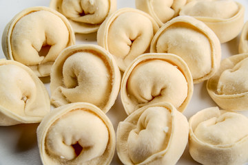 Dumplings, pelmeni, ravioli rotate On white backround
