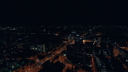 Night aerial shot of busy city traffic life