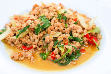 Stir-fried pork with basil leaves.