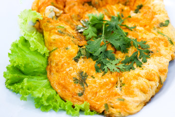 Omelette fried eggs with vegetables