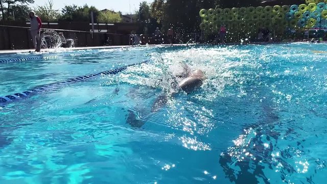 Professional swimmer in slow motion