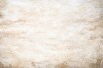 Old brown and white paper stained with coffee. Vintage abstract background.